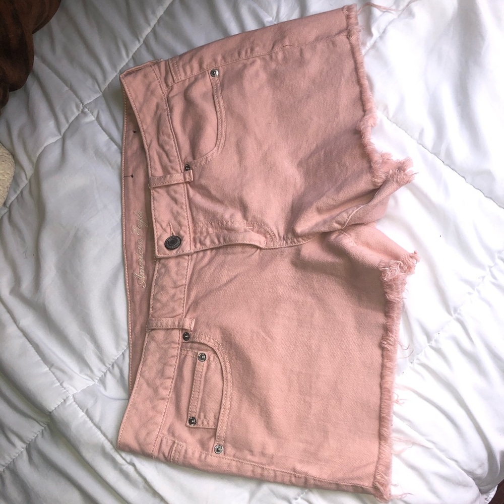 Pink/coral American eagle shorts.